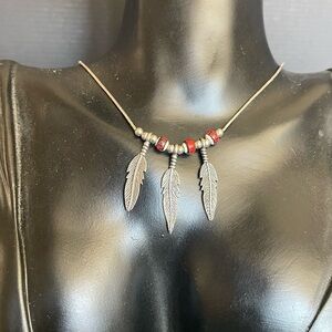 Sterling silver feather red bead barrel claps necklace